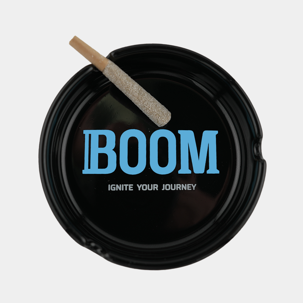 Boom THCa Ashtray shown in use with diamond infused pre-roll resting inside ash tray.