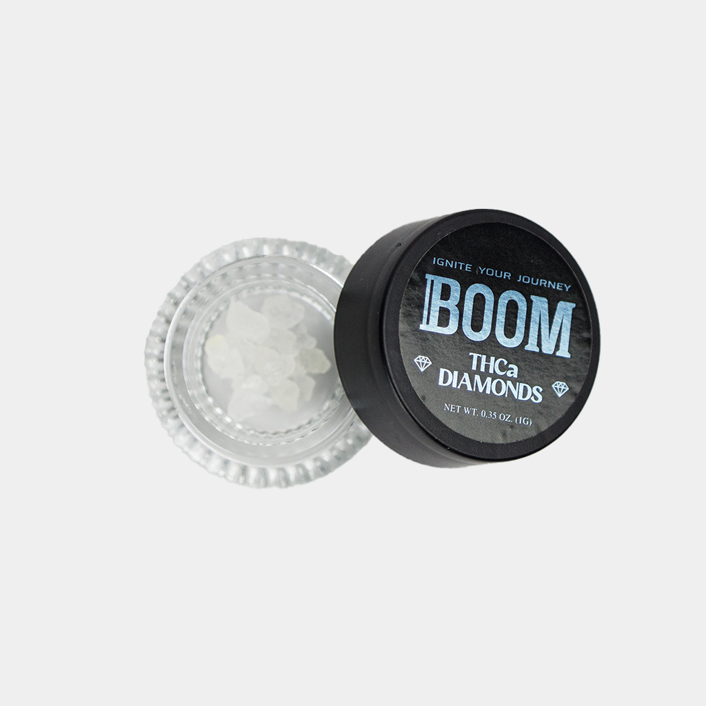 THCa Diamond Concentrate from Boom. Rocky, Crystal Appearance, Inside 1 Gram Jar Container with lid.
