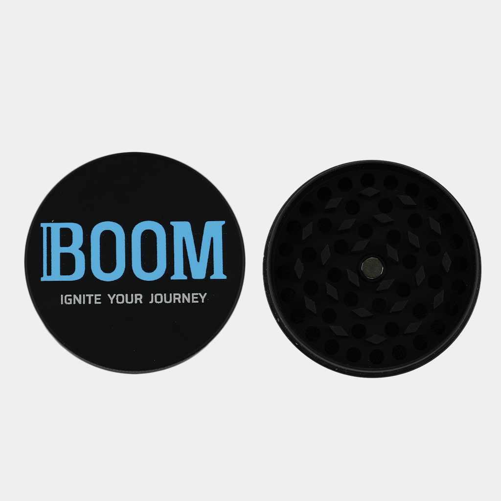 Boom.Shop  brand grinder.  4 Piece THCa Flower grinder with kief catcher with Boom Logo.